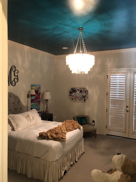 Dark ceiling paint in a bedroom.